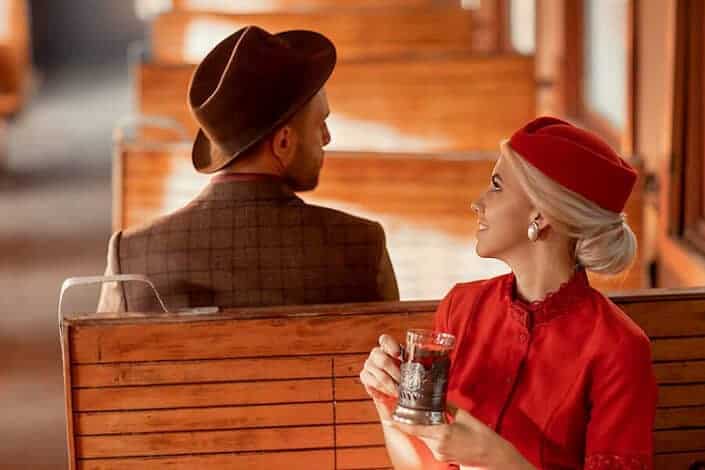 Woman talking to a man