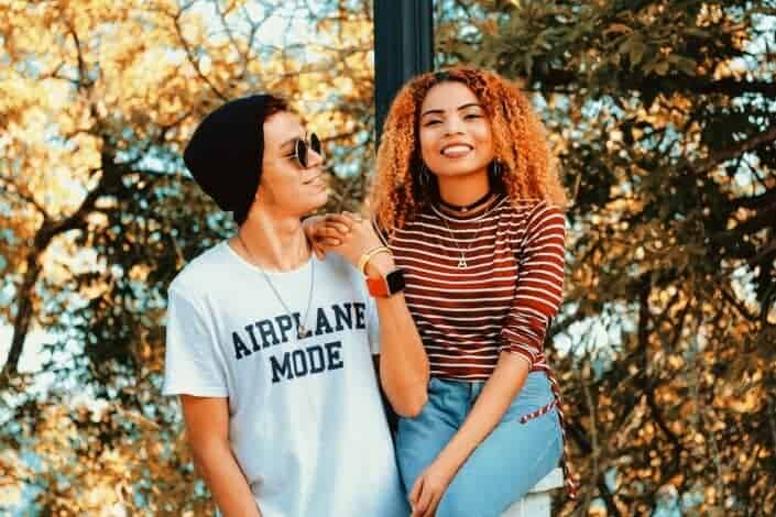 Couple Standing Beside Trees