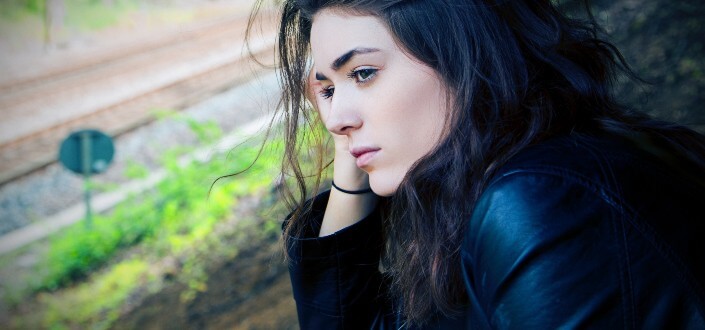 beautiful woman staring outside