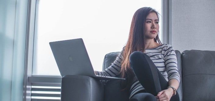Girl sitting with her laptop