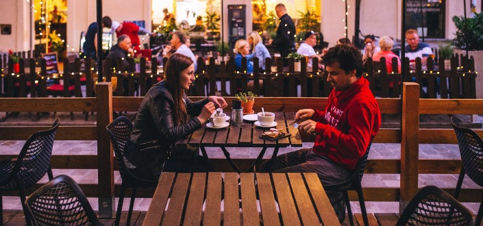 Couple eating outdoors