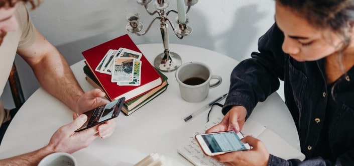 Couple busy with their phones