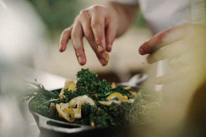 person preparing seaweed salad