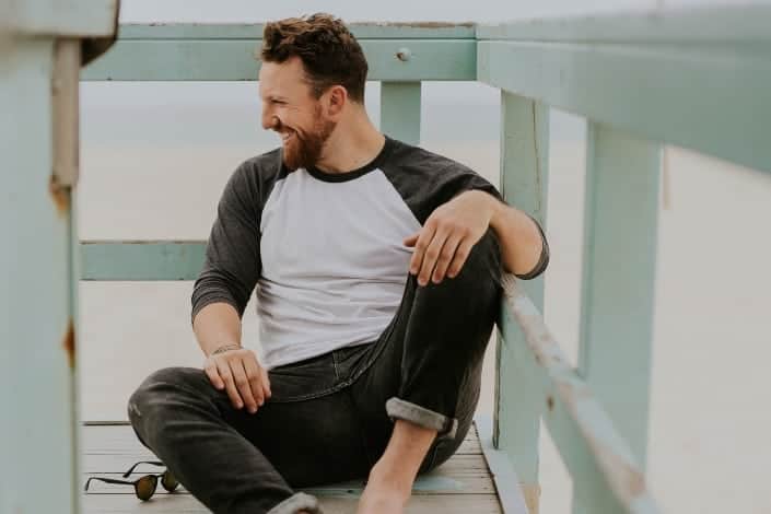 man sitting in the balcony