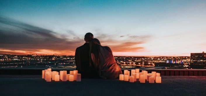 couple with scented candles