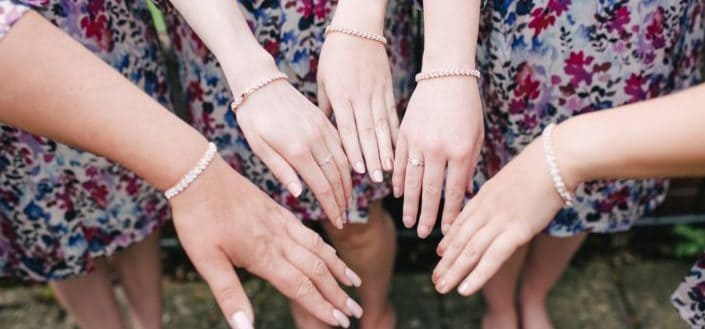 Women Showing Their Bracelets