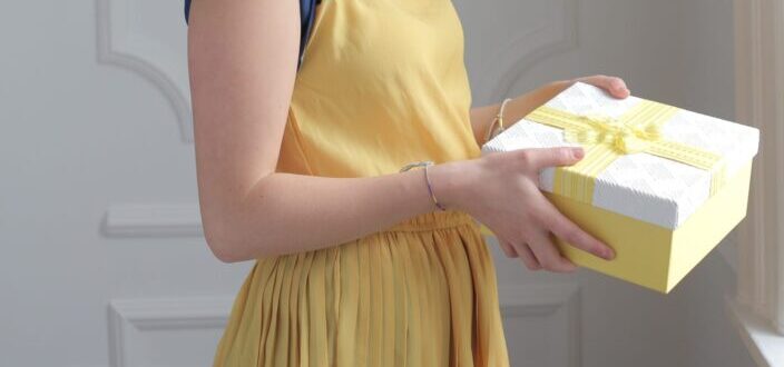woman holding a gift 
