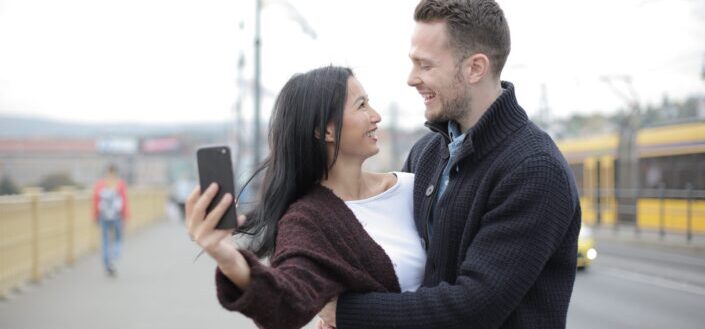 Couple taking a photo together
