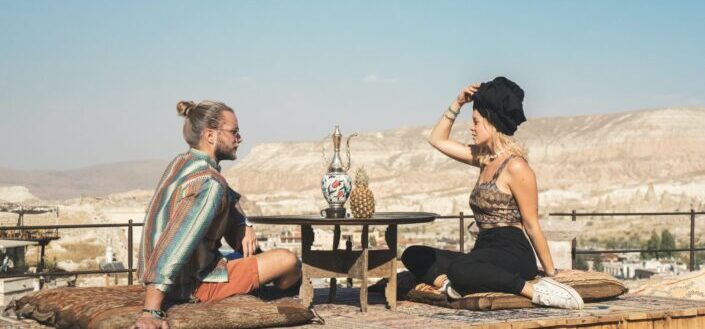 Couple on a date overlooking mountains