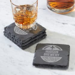 Personalized Craft Brew Slate Coasters with a glass of beer resting on one