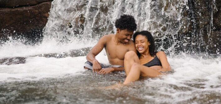couple having fun in the river