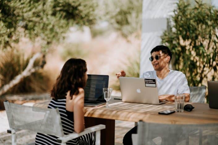 Couple sitting while talking to each other