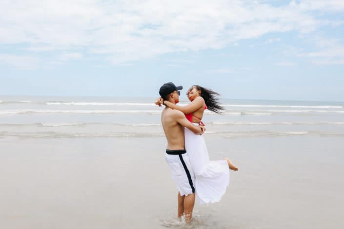 man carrying his girl