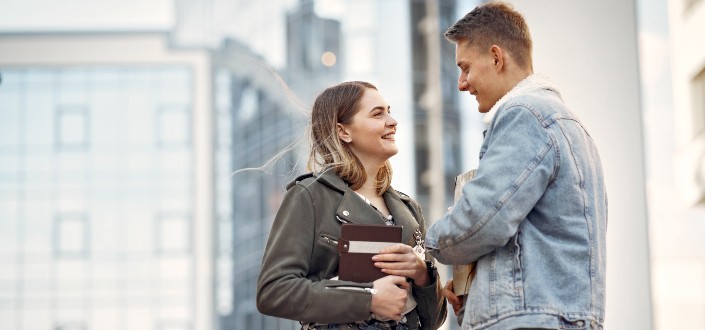 young couple happily flirting with each other