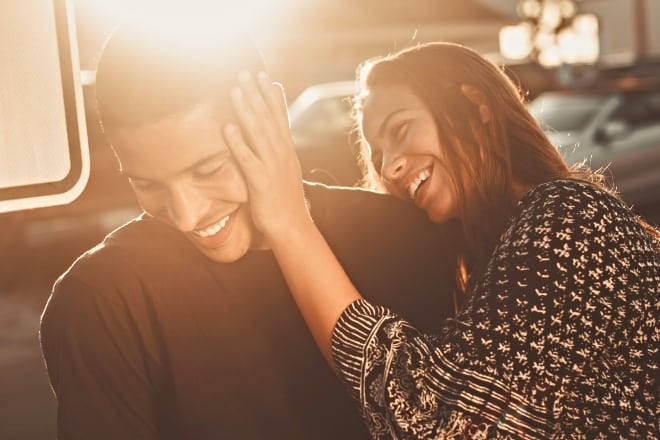couple teasing each other at daylight - How to make him want you
