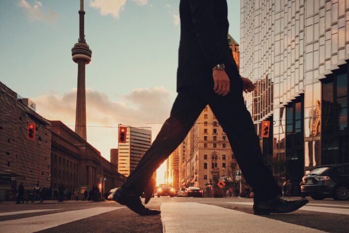 Person walking across the pedestrian lane.