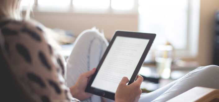Scrolling through a tablet.