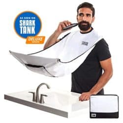 Man shaving his beard using beard king