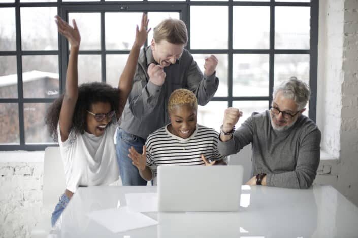 Office workers celebrating