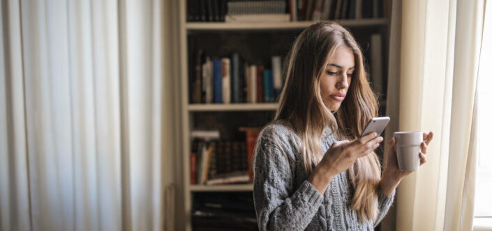 woman checking on her phone