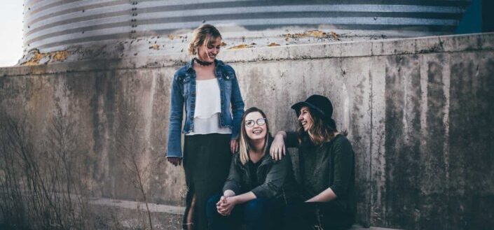 Cool girls having fun together in a strange place.