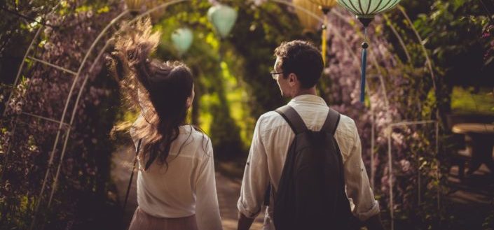 Couple holding hands at the park