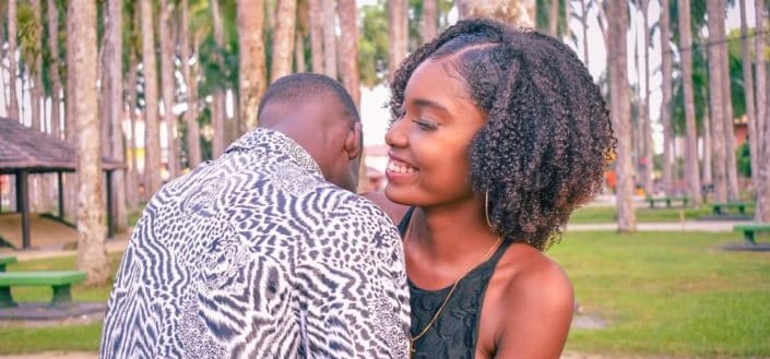 Woman happily embracing his man