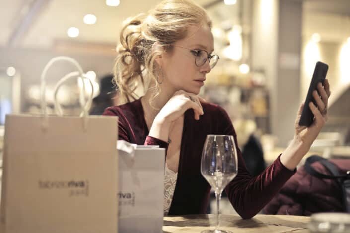 elegant woman surfing in her phone