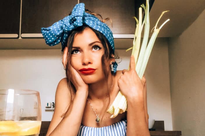 A woman holding vegetables