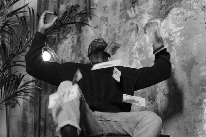 Man throwing money in the air