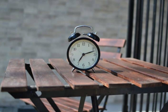 black steel alarm clock 