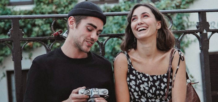 woman laughing at the joke of the man