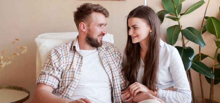 Couple smiling at each other