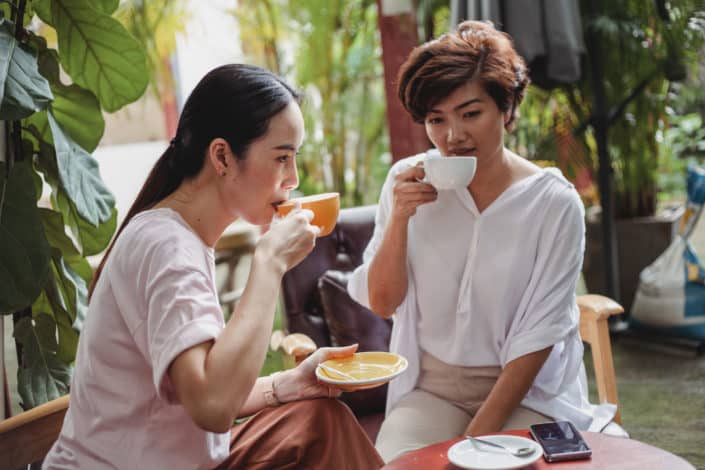 Two girls having coffee