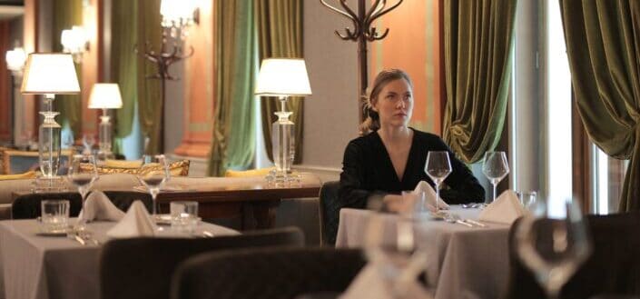 Woman Alone In a Restaurant