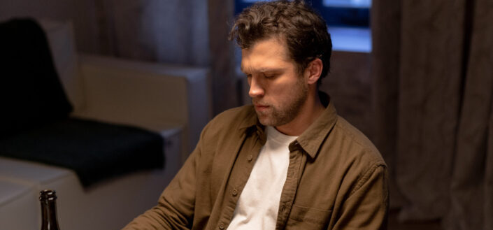 Serious Man Looking Down
