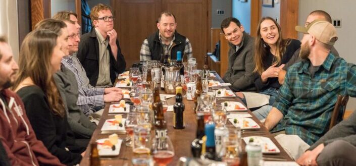 Group of Friends Having Dinner Laughing and Talking