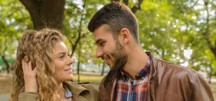 a couple passionately staring at each other