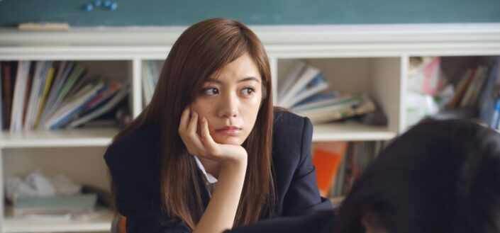 A woman looking to her side