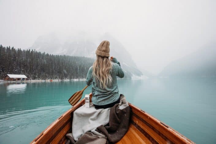 Woman rowing a boat