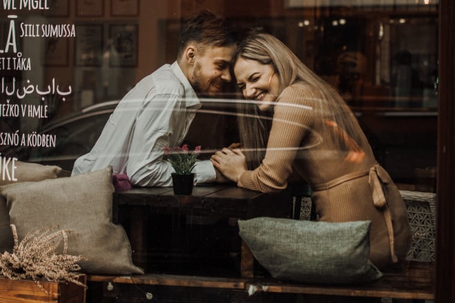 Couple being sweet inside cafe - Flirty conversation starters