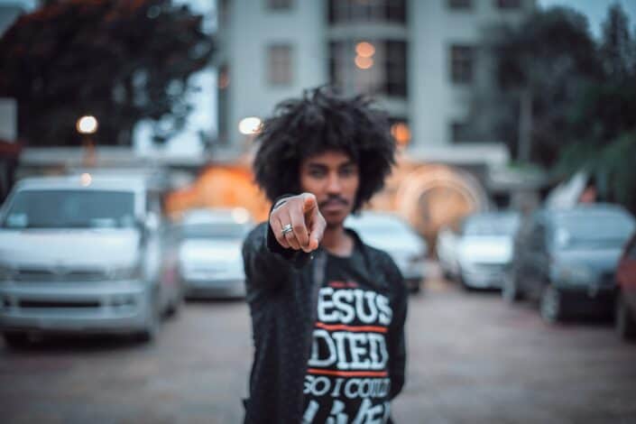 a man pointing towards the camera
