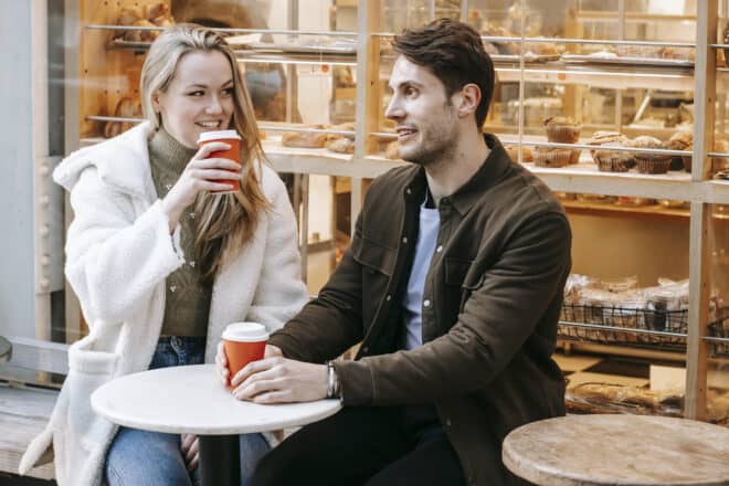 deep questions to ask a girl - Delighted young couple having date in street cafeteria