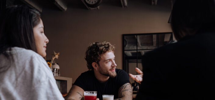 a group of friends having a conversation