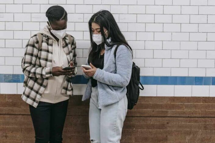 Multiracial women interacting with each other in University