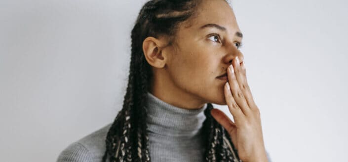 worried woman looking at the right side direction