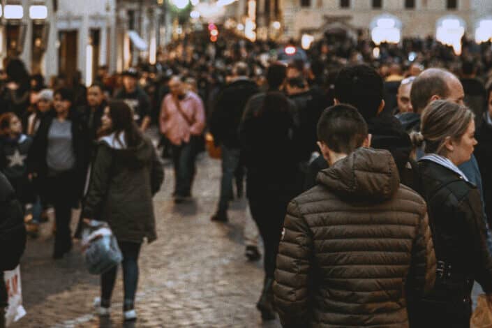a busy and crowded street full of people