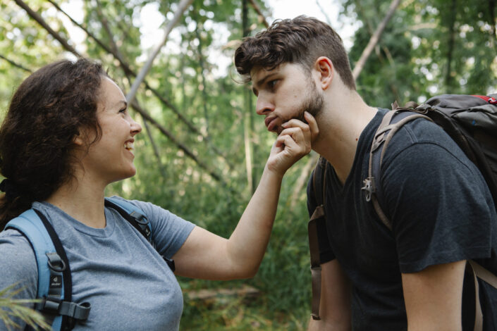 Hiking couple playing around