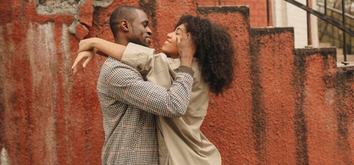 Multiracial couple Hugging Each Other