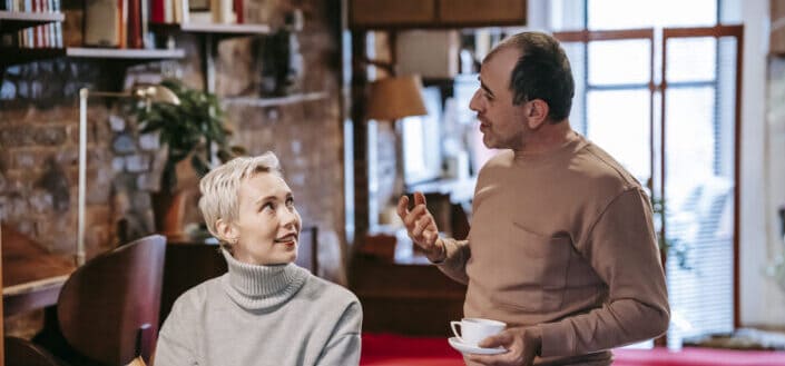 couple talking about the book 